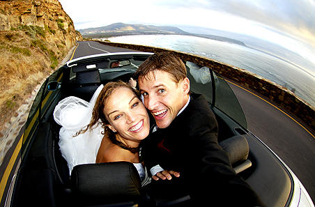 copyright Andrew Woodburn, wedding photography of the bridal couple  on Chapmans Peak drive, Capetown